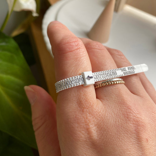 Cicee ring sizer on hand