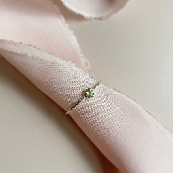 Cicee simplicity ring peridot green gemstone hammered silver band tube set stone August birthstone