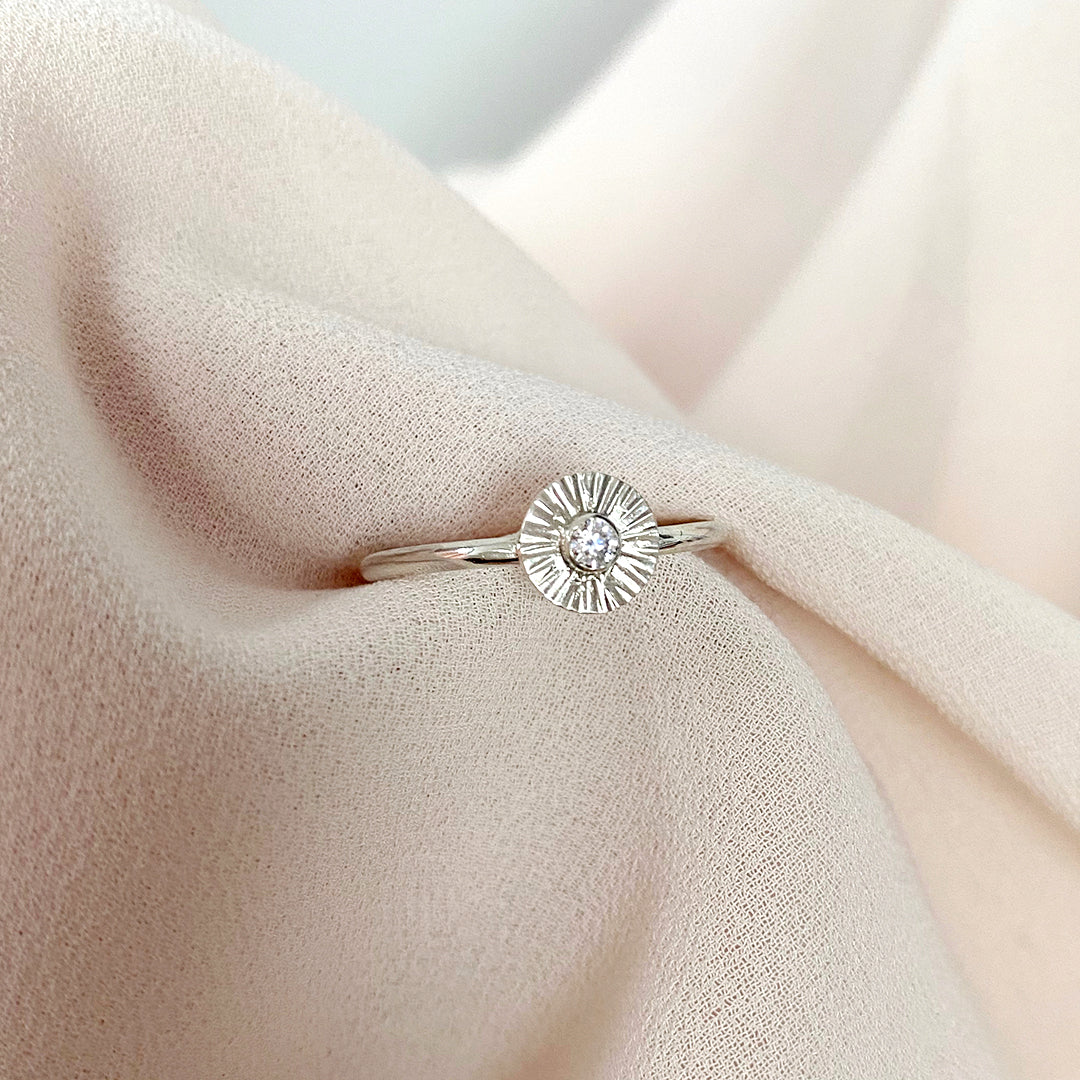 Silver and moissanite sun ring