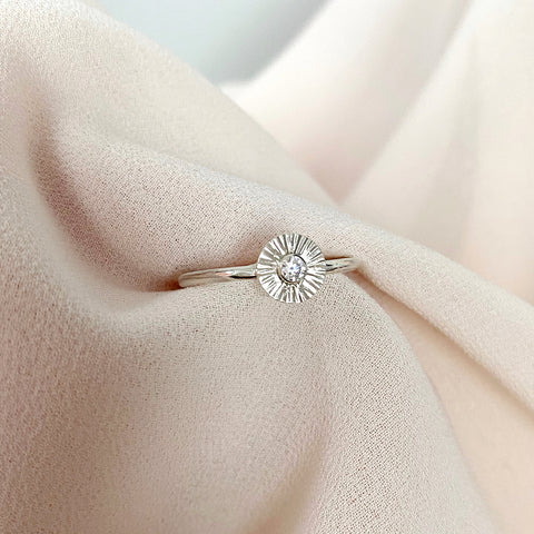 Silver and moissanite sun ring