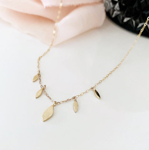 Cicee falling leaves gold necklace
