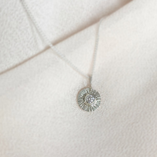 Silver and moissanite sun necklace
